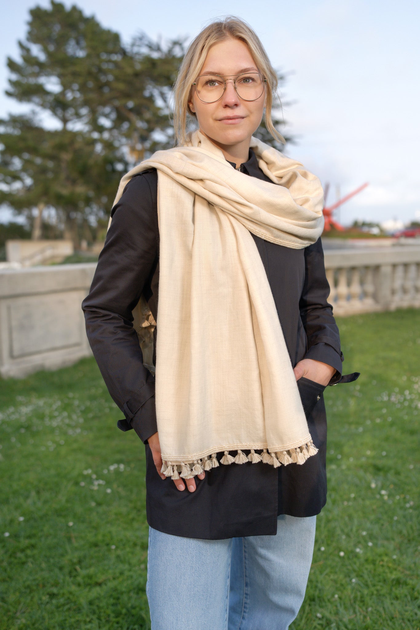 Ivory pashmina shawl with hand embroidered pearl and tassel border