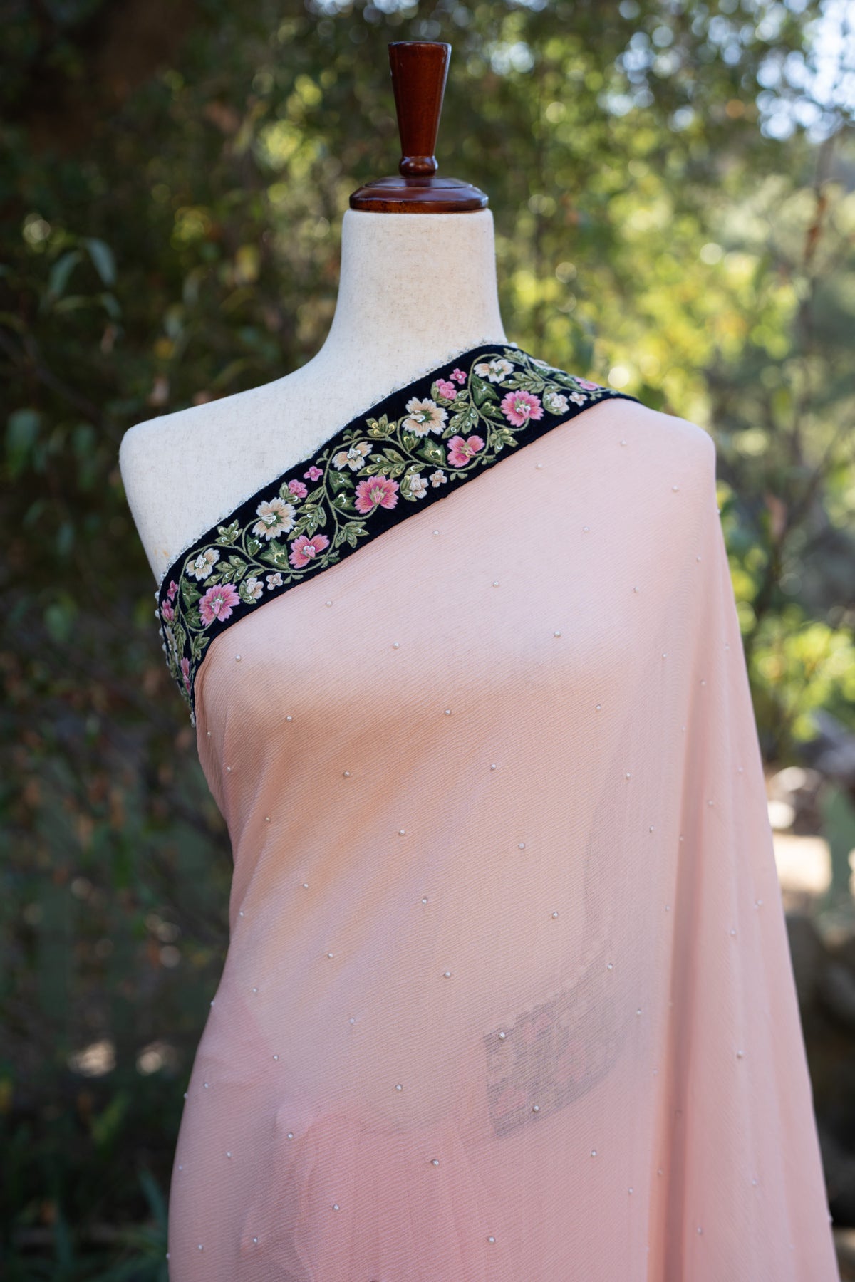 Pink chiffon saree with embroidered border