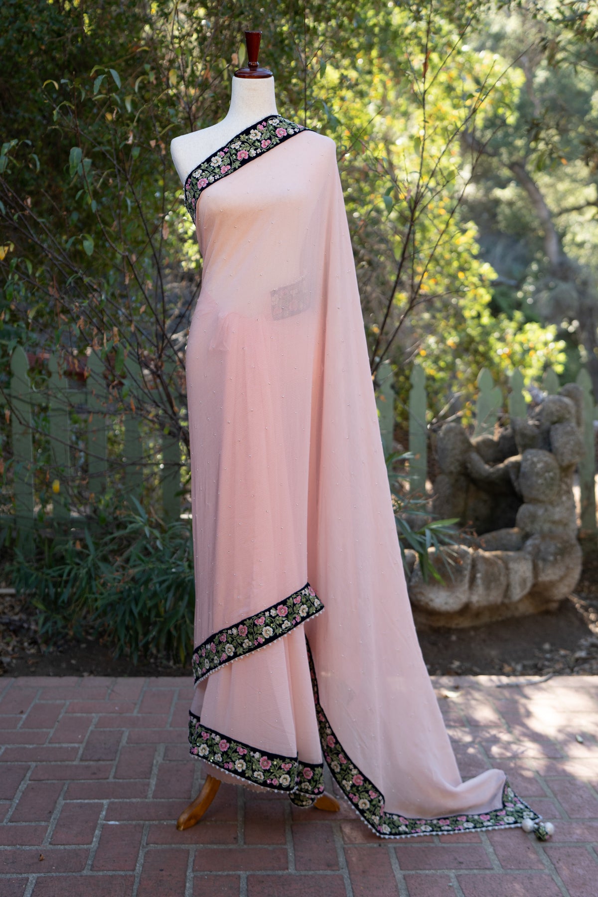 Pink chiffon saree with embroidered border