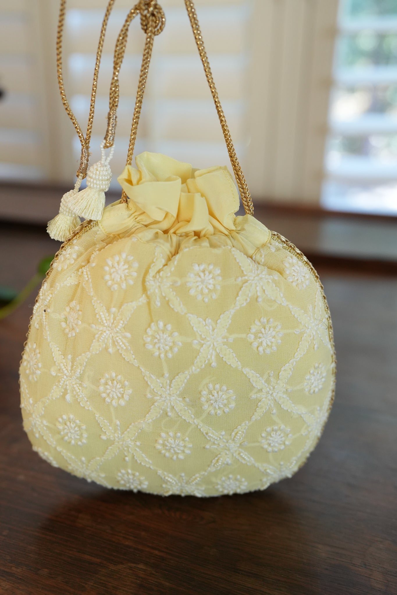 Yellow Chikankari potli bag