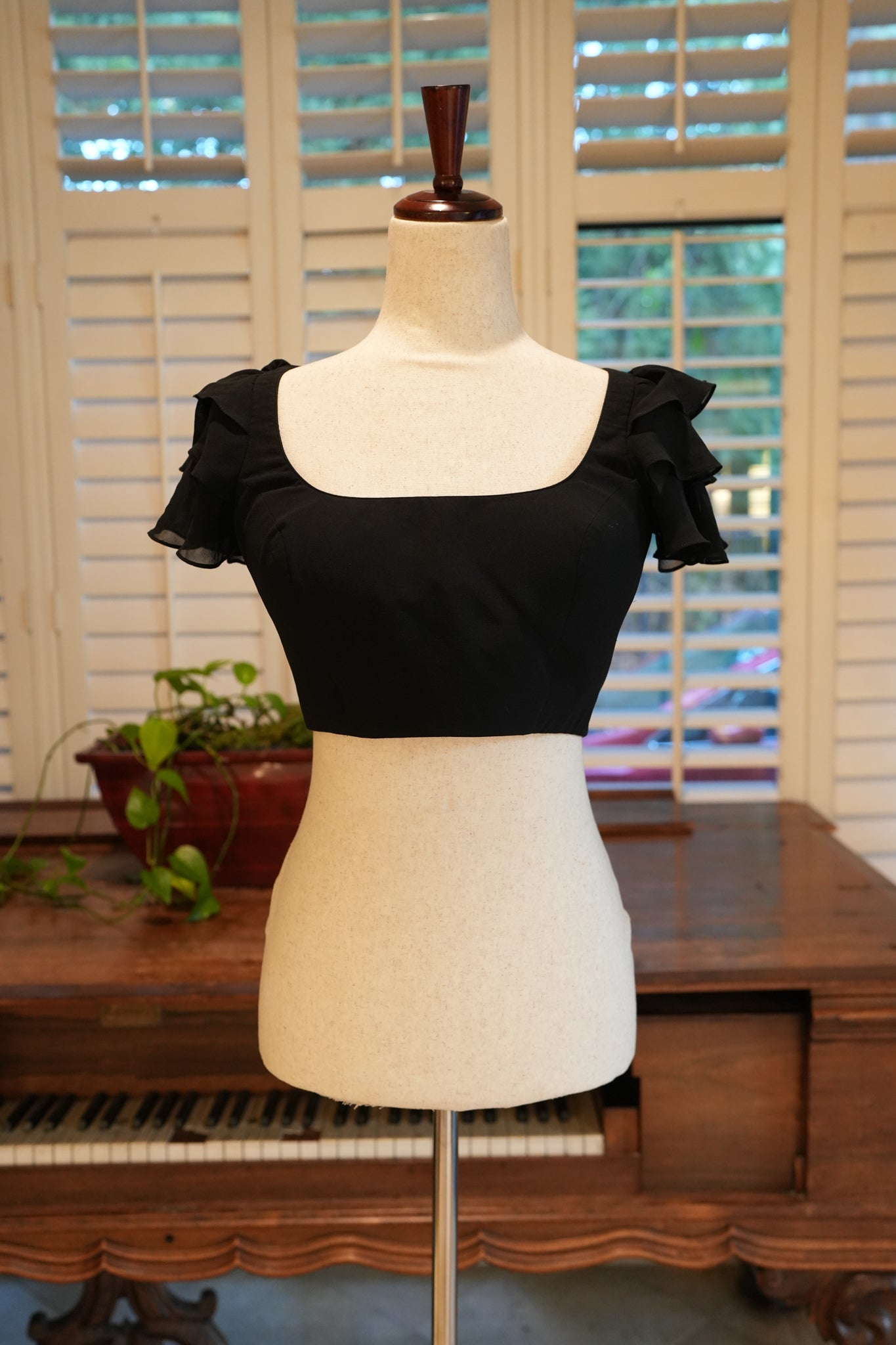 Black ruffle blouse