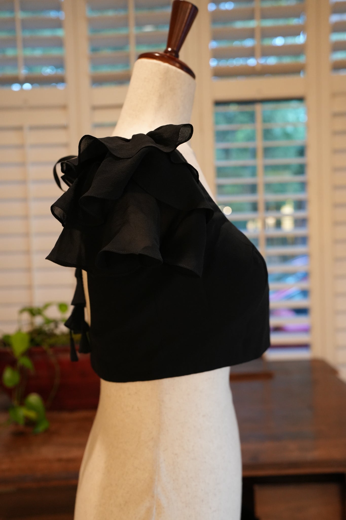 Black ruffle blouse