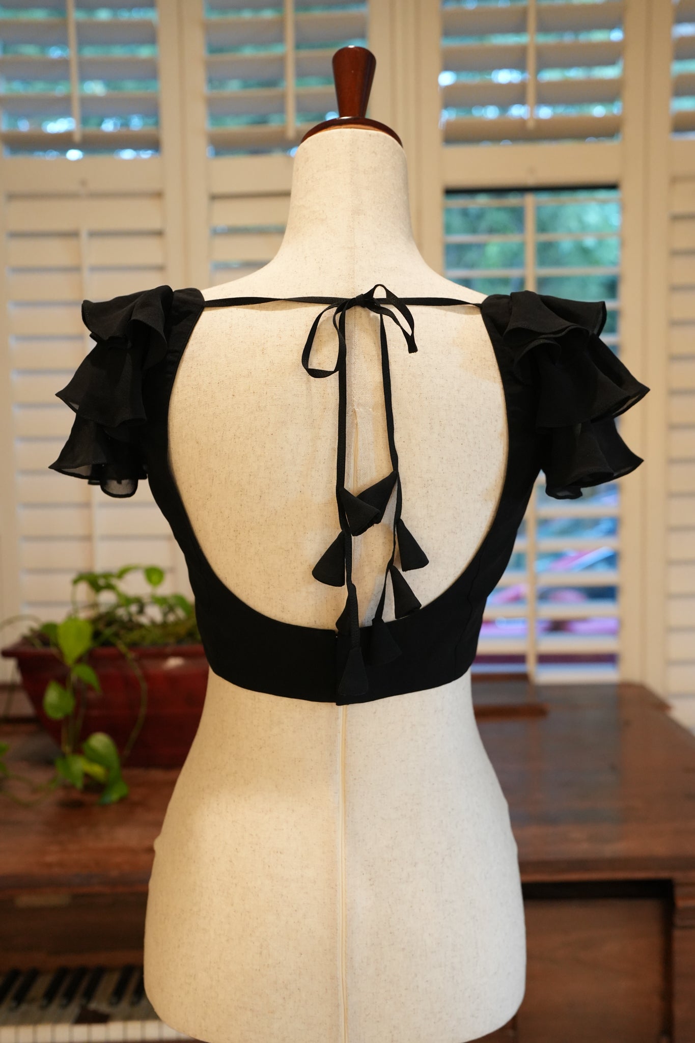 Black ruffle blouse