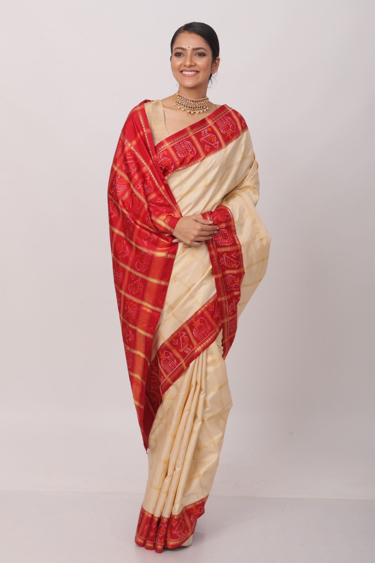Creme and Red Gharchola sari