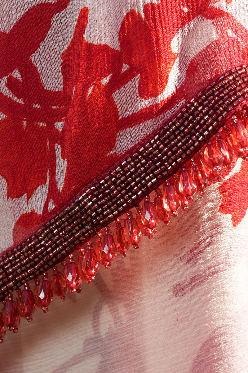 Printed chiffon saree with hand embroidered border