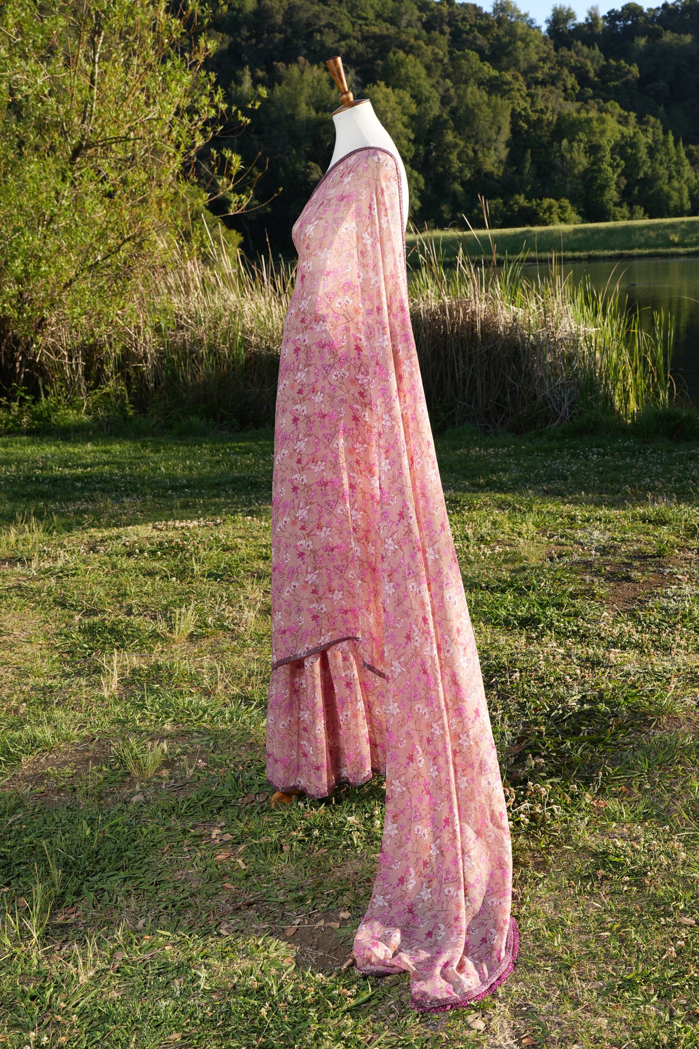 Printed chiffon saree with hand embroidered border