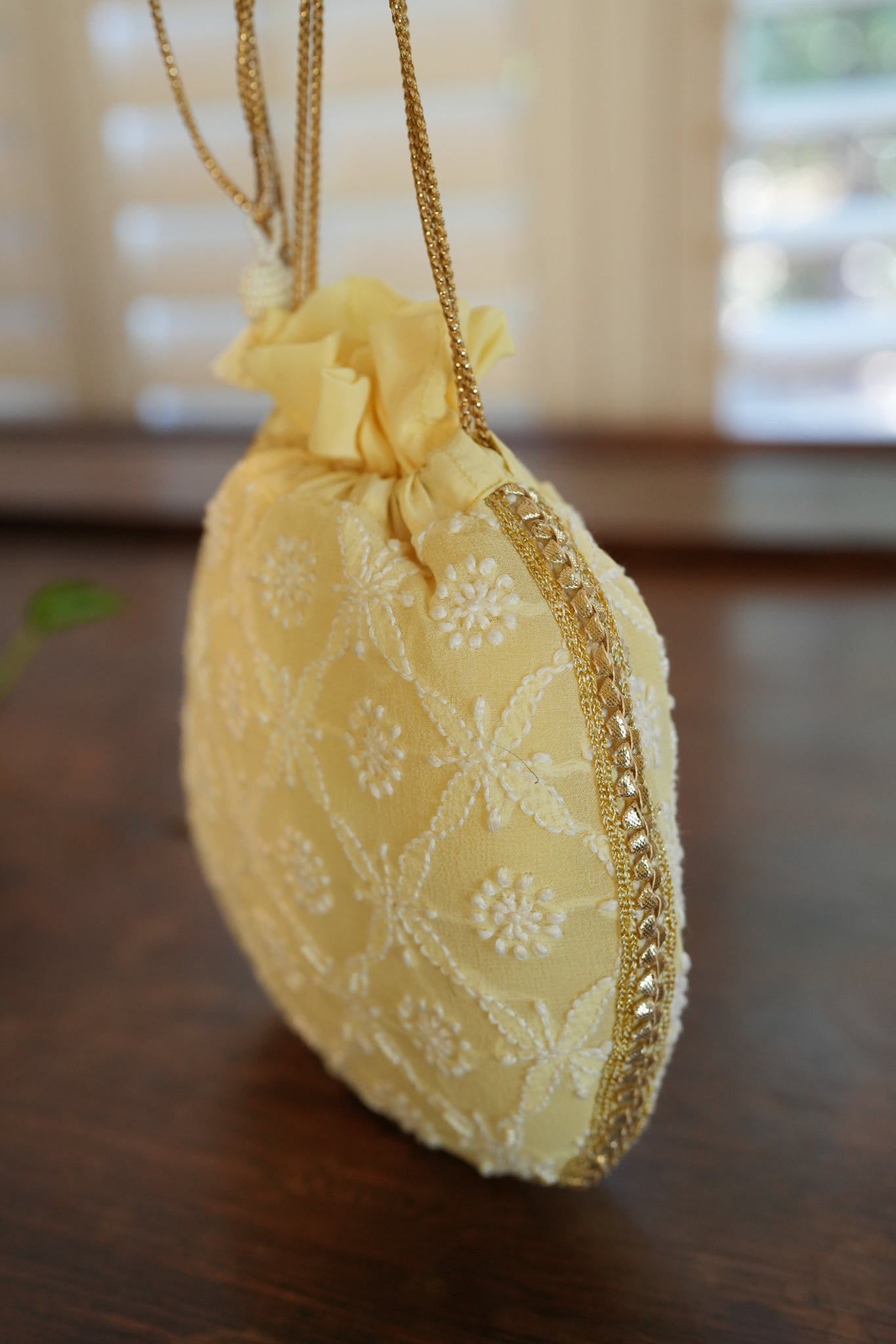 Yellow Chikankari potli bag