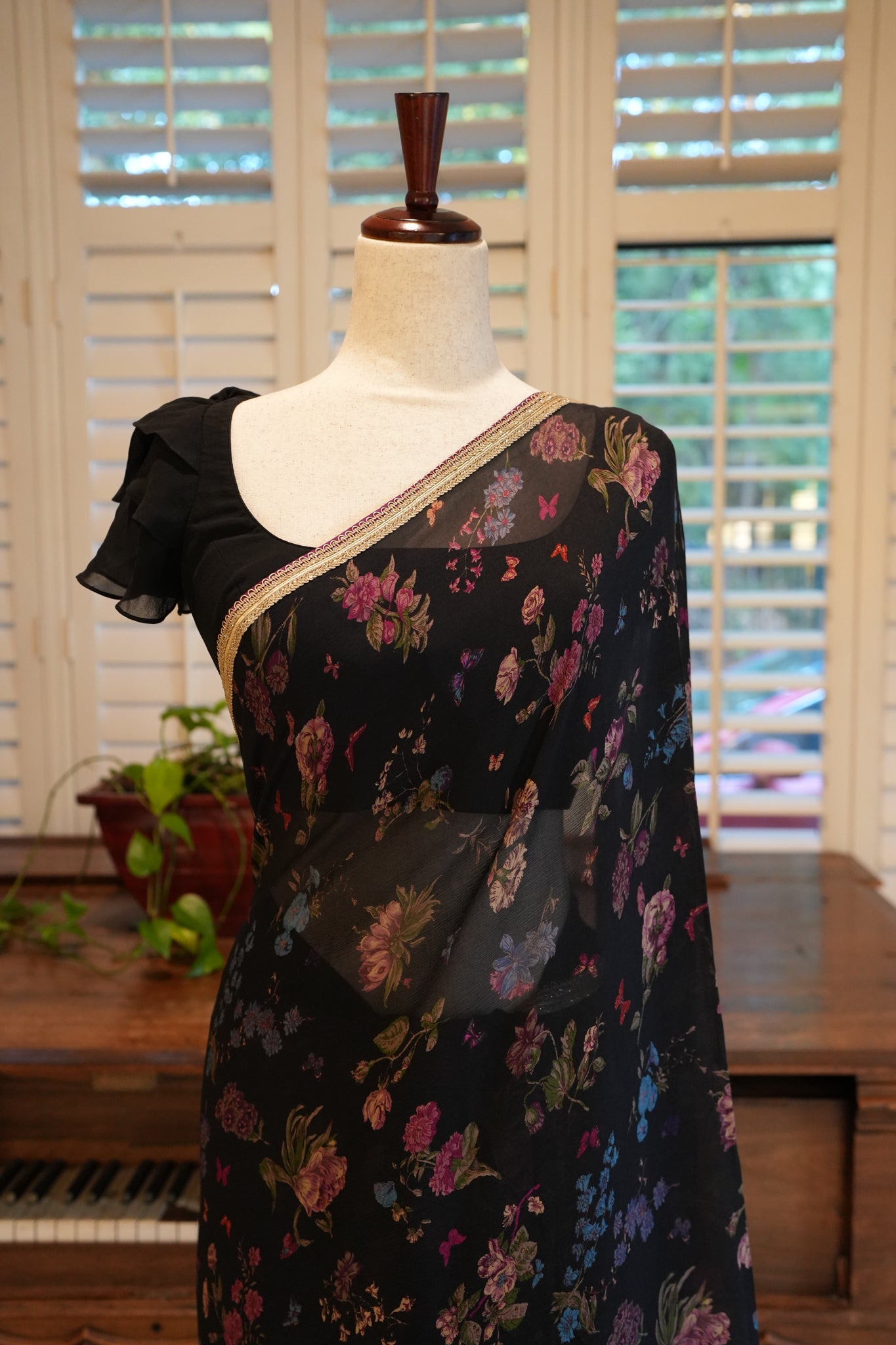 Black printed chiffon saree with border
