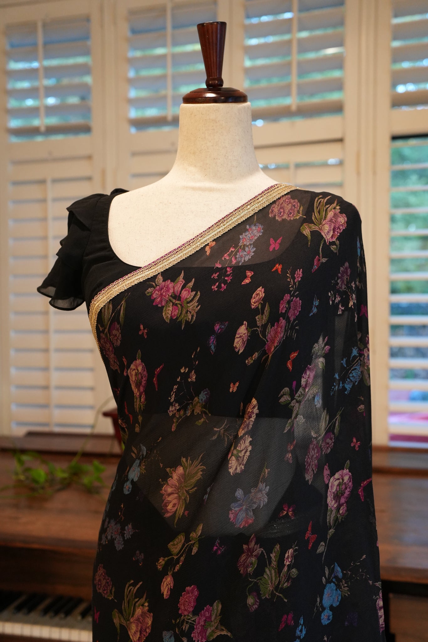 Black printed chiffon saree with border
