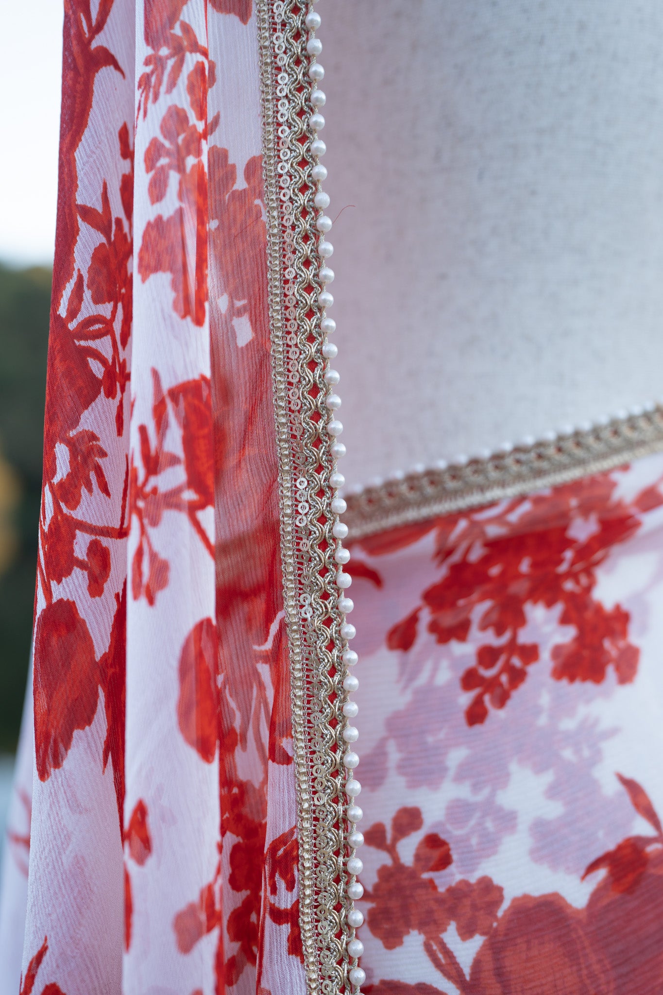 Printed chiffon saree with small lace border