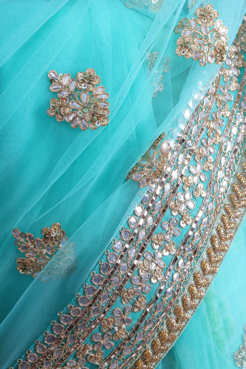 Sabyasachi turquoise tulle saree with gota embroidery